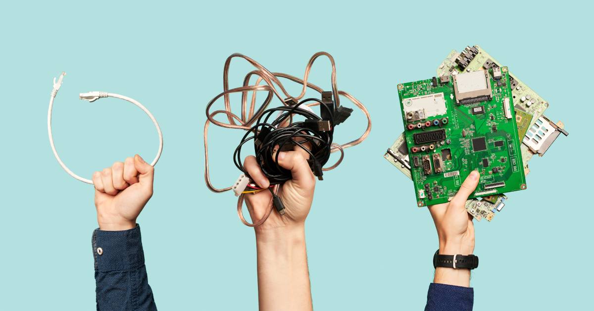 A group of people raising their hands while holding outdated electronics for e-waste recycling over a turquoise background.