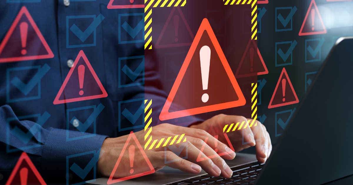 An unseen person types on a laptop. Several red warning triangles and blue checkmark icons are overlaid on the scene.